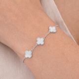 Urban Pizazz Model Wearing 925 Sterling Silver Mother Of Pearl Clover Bracelet With Adjustable Chain Extender Design