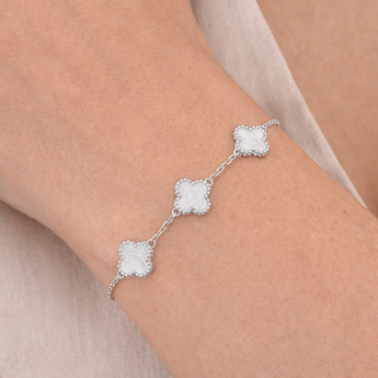 Urban Pizazz Model Wearing 925 Sterling Silver Mother Of Pearl Clover Bracelet With Adjustable Chain Extender Design