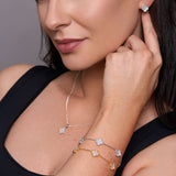 925 Sterling Silver Jewellery Collection Featuring Mother Of Pearl In A Popular Clover Jewellery Design. Model Is Wearing A Mixture of 18ct Gold Plated and 925 Sterling Silver Designs