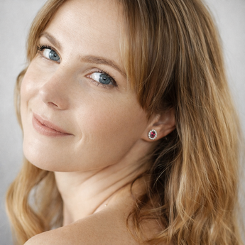 Urban Pizazz Model Wearing 925 Sterling Silver Oval Halo Ruby CZ Stud Earrings