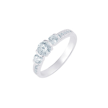 The Aurelia Promise Ring features three sparkling CZ stones on a 925 sterling silver band with pavé accents. Perfect as a promise, engagement or occasion ring.