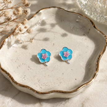 Sterling Silver & Blue Enamel CZ Flower stud Earrings on a trinklet jewellery tray