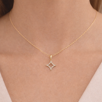 Urban Pizazz Model Wearing 18ct Gold Plated Amelie Cubic Zirconia Star Necklace