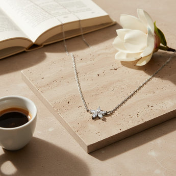 Sterling Silver & Cubic Zirconia Flower Necklace flat lay display