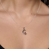 Urban Pizazz Model Wearing 925 Sterling Silver and Rose Gold Two-tone Cat On Moon Pendant Necklace with Silver Curb Chain
