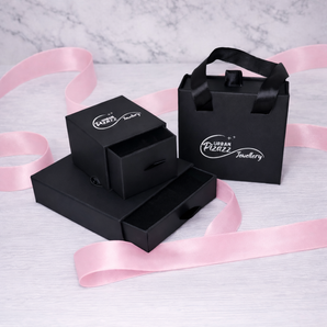 Selection of Black Gift Boxes for Jewellery With urban Pizazz Logo On them