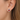 Urban Pizazz Model Wearing 925 Sterling Silver Ruby Teardrop Cubic Zirconia Stud Earrings