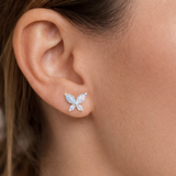 Urban Pizazz Model Wearing Sterling Silver Blue Opal Butterfly Stud Earrings