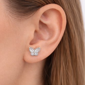 Urban Pizazz Model Wearing Sterling Silver & Cubic Zirconia Butterfly Stud Earrings