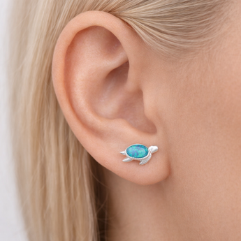 Urban Pizazz Model Wearing Sterling Silver and Blue Opan Turtle Stud Earrings