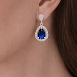 Urban Pizazz Model Wearing 925 Sterling Silver Fancy Sapphire CZ Teardrop Stud Earrings