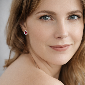 Urban Pizazz Model Wearing 925 Sterling Silver Ruby Teardrop Cubic Zirconia Stud Earrings