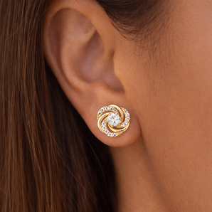 Urban Pizazz Model Wearing 9ct Gold Cubic Zirconia Flower Knot Earrings