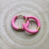 Amnesia Jewellery | Hot Pink Enamel Abi Hoop Earrings. Our Abi Hinged Hoop Earrings are made from gold plated stainless steel with a vibrant pink coloured enamel. Tarnish Free and Waterproof. Shop now for quality Jewellery/Jewelry!