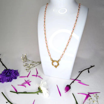 Amnesia Jewellery | Gold Plated Stainless Steel Abi Paperclip Chain Necklace. Our 20" Abi Twisted Paperclip Necklace is made from gold plated stainless steel with pink enamel decoration and sailors clasp. Tarnish Free and Waterproof. Shop now for quality Jewellery/Jewelry!