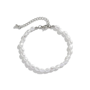 Faux baroque Pearl bracelet on a white background
