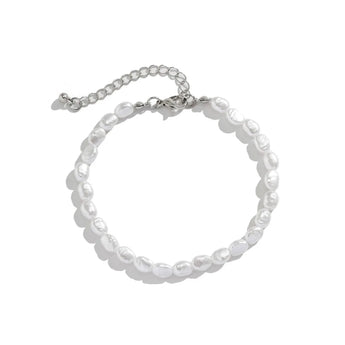 Faux baroque Pearl bracelet on a white background