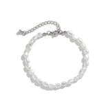 Faux baroque Pearl bracelet on a white background