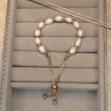 Embrace timeless coastal elegance with our Beach Pearl Bolo Bracelet. Featuring freshwater pearls delicately spaced with polished gold-toned beads, the adjustable bolo clasp ensures a comfortable fit for any wrist. Shop now for quality Jewellery/Jewelry!