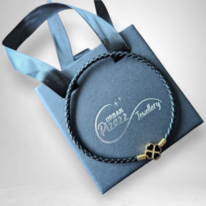 Black Leather And Gold Plated Clover Leaf Charm Bracelet