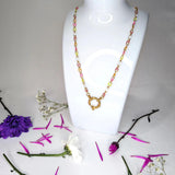 Amnesia Jewellery | Gold Plated Stainless Steel Cassie Paperclip Chain Necklace. Our 20" Cassie Twisted Paperclip Necklace is made from gold plated stainless steel with multi coloured enamel and sailors clasp. Tarnish Free and Waterproof. Shop now for quality Jewellery/Jewelry!