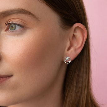 Urban Pizazz Model Wearing Sterling Silver Circle Opal and Cubic Zirconia Stud Earrings