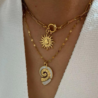Amnesia Jewellery | Gold Plated Stainless Steel Conch and Sun stackable Necklace. Our elegant Conch and Sun Stacking Necklace Set, made from durable 18ct gold plated stainless steel and enamel. Tarnish Free and Waterproof. Shop now for quality Jewellery/Jewelry!
