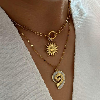 Amnesia Jewellery | Gold Plated Stainless Steel Conch and Sun stackable Necklace. Our elegant Conch and Sun Stacking Necklace Set, made from durable 18ct gold plated stainless steel and enamel. Tarnish Free and Waterproof. Shop now for quality Jewellery/Jewelry!