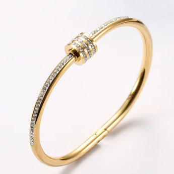 Amnesia Jewellery | Gold Plated /Stainless Steel / Rose gold Crystal Bangle. Our Crystal Wrap Bangle, crafted from stainless steel and elegantly wrapped in a choice of rose gold, yellow gold, or classic stainless steel. Tarnish Free and waterproof. Shop now for quality Jewellery/Jewelry!