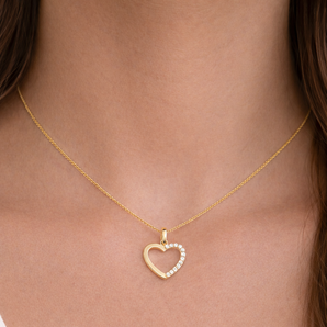 Urban Pizazz Model wearing a 9ct Gold Cubic Zirconia Open Heart Pendant Necklace