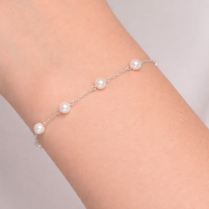 Urban Pizazz Model Wearing Sterling Silver Dainty Pearl Bead Bracelet