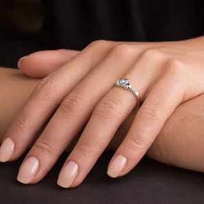 Shop this December birthstone blue topaz Claddagh ring in silver. Stunning jewellery symbolizing love, loyalty & friendship. Perfect gift from Urban Pizazz UK.