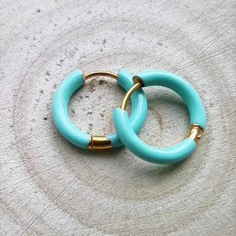 Amnesia Jewellery | Turquoise Enamel Demi Hoop Earrings. Our Demi Hinged Hoop Earrings are made from gold plated stainless steel with a vibrant turquoise blue coloured enamel. Tarnish Free and Waterproof. Shop now for quality Jewellery/Jewelry!