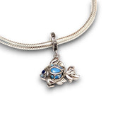 Sterling silver goldfish dangle charm featuring blue opal & CZ accents. Hypoallergenic, gift-ready and compatible with European style charm bracelets.