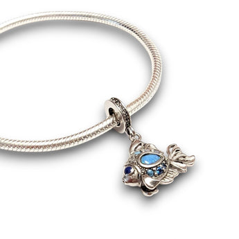 Sterling silver goldfish dangle charm featuring blue opal & CZ accents. Hypoallergenic, gift-ready and compatible with European style charm bracelets.
