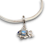 Sterling silver goldfish dangle charm featuring blue opal & CZ accents. Hypoallergenic, gift-ready and compatible with European style charm bracelets.