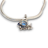 Sterling silver goldfish dangle charm featuring blue opal & CZ accents. Hypoallergenic, gift-ready and compatible with European style charm bracelets.