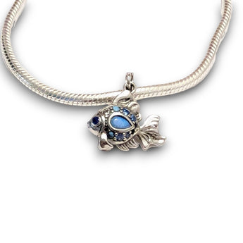 Sterling silver goldfish dangle charm featuring blue opal & CZ accents. Hypoallergenic, gift-ready and compatible with European style charm bracelets.