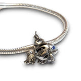 Sterling silver goldfish dangle charm featuring blue opal & CZ accents. Hypoallergenic, gift-ready and compatible with European style charm bracelets.