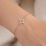 Urban Pizazz Model Wearing 18ct Gold Plated Amelie Cubic Zirconia Star Bracelet