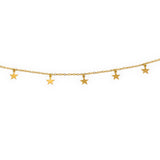 Gold plated star necklace on a white background