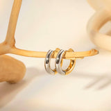 Amnesia Jewellery | Gold Plated and Stainless Steel Hinged Hoop Earrings. Elegant gold plated stainless steel two tone chunky hinged hoop earrings, crafted from 18ct gold plated stainless steel, tarnish free and waterproof. Shop now for quality Jewellery/Jewelry!