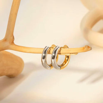 Amnesia Jewellery | Gold Plated and Stainless Steel Hinged Hoop Earrings. Elegant gold plated stainless steel two tone chunky hinged hoop earrings, crafted from 18ct gold plated stainless steel, tarnish free and waterproof. Shop now for quality Jewellery/Jewelry!