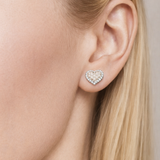 Urban Pizazz Model Wearing Pearl and Cubic Zirconia Sterling Silver Heart Stud Earrings