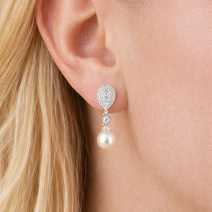 Urban Pizazz Model Wearing Pearl and Cubic Zirconia Teardrop Sterling Silver Earrings
