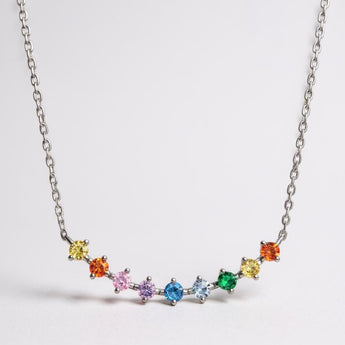 Rainbow Bar Necklace – 925 Silver & CZ Gemstones by Urban Pizazz. Discover the Rainbow Bar Necklace in 925 silver with vibrant colourful cubic zirconia. A dainty, colorful piece perfect for everyday wear or gifting with pride