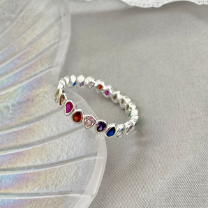 Rainbow Cubic Zirconia Ring – 925 Silver Stacking Band by Urban Pizazz. Shop our 925 silver rainbow ring with colourful CZ stones. Dainty, stackable and hypoallergenic – a perfect everyday piece with a bold, playful twist.