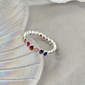 Rainbow Cubic Zirconia Ring – 925 Silver Stacking Band by Urban Pizazz. Shop our 925 silver rainbow ring with colourful CZ stones. Dainty, stackable and hypoallergenic – a perfect everyday piece with a bold, playful twist.