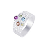 Rainbow Dots Statement Ring – 925 Sterling Silver by Urban Pizazz. Turn heads with our Rainbow Dots Statement Ring in 925 silver. Featuring vibrant CZ stones, this bold piece is hypoallergenic and full of personality.