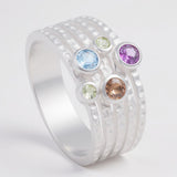 Rainbow Dots Statement Ring – 925 Sterling Silver by Urban Pizazz. Turn heads with our Rainbow Dots Statement Ring in 925 silver. Featuring vibrant CZ stones, this bold piece is hypoallergenic and full of personality.